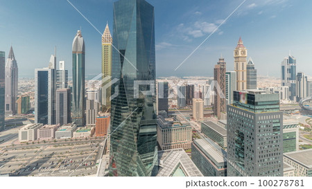 Panorama showing futuristic skyscrapers in financial district business center in Dubai on Sheikh Zayed road timelapse 100278781