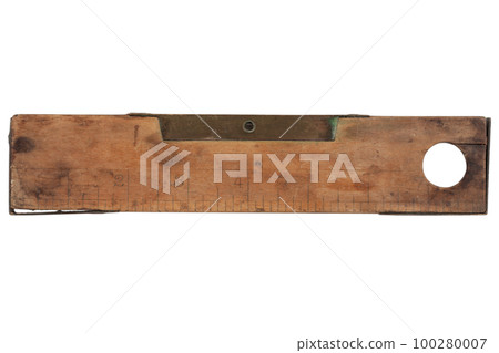 Antique carpenter's boxwood ruler with spirit level from 19th century isolated on white. Antique carpenter's boxwood ruler with spirit level from 19th century isolated on white. 100280007