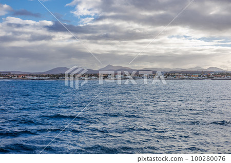 View of the town of Corralejo from the ferry Lanzarote-Fuerteventura View of the town of Corralejo from the ferry Lanzarote-Fuerteventura 100280076