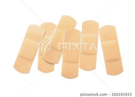 Medical sticking plasters isolated on white. First aid item Medical sticking plasters isolated on white. First aid item 100283933