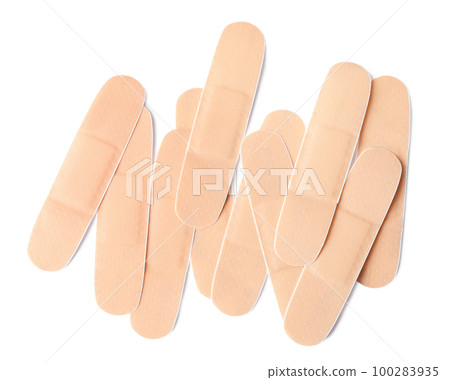 Medical sticking plasters isolated on white. First aid item Medical sticking plasters isolated on white. First aid item 100283935