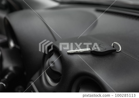 Key in new modern automobile. Car buying 100285113