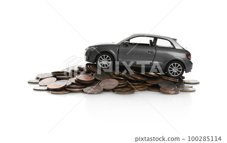 Miniature automobile model and money on white background. Car buying Miniature automobile model and money on white background. Car buying 100285114