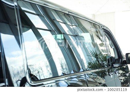 Modern car with tinting foil on window, closeup Modern car with tinting foil on window, closeup 100285119