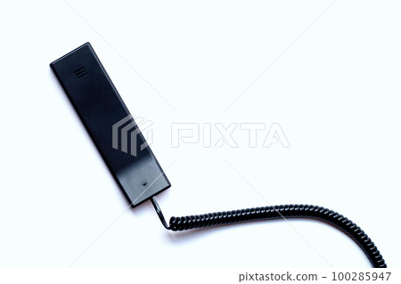 Handset of landline phone on white background. Handset of landline phone on white background. 100285947