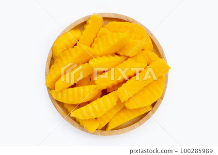 Sweet yellow mango fruit slices Sweet yellow mango fruit slices 100285989