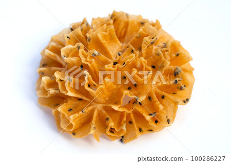Crispy lotus blossom cookie in white background. 100286227