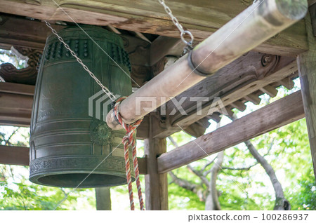 A large bell waiting for its turn at Chorakuji temple in summer in Kyoto A large bell waiting for its turn at Chorakuji temple in summer in Kyoto 100286937