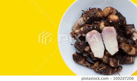 Boiled taro on yellow background. Boiled taro on yellow background. 100287206