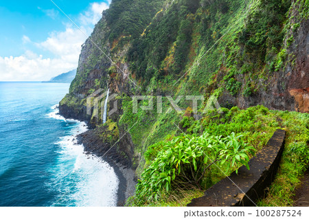 Beautiful view of Cascata do Veu da Noiva waterfall or Bridal Veil near Porto Moniz and Seixal. Madeira Island, Portugal 100287524