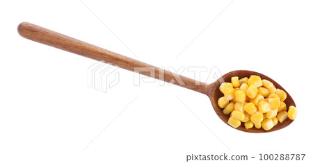 Delicious canned corn in spoon isolated on white, top view Delicious canned corn in spoon isolated on white, top view 100288787