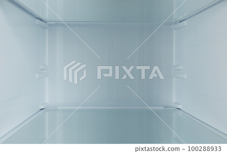 Shelf of empty modern refrigerator, closeup view Shelf of empty modern refrigerator, closeup view 100288933