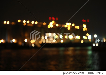 Blurred view of docks at night. Bokeh effect Blurred view of docks at night. Bokeh effect 100288947