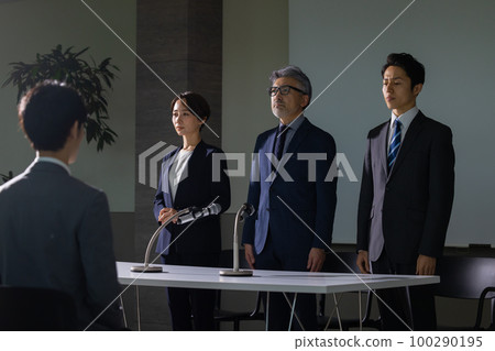 A man with gray hair who looks like an apology interview A man with gray hair who looks like an apology interview 100290195