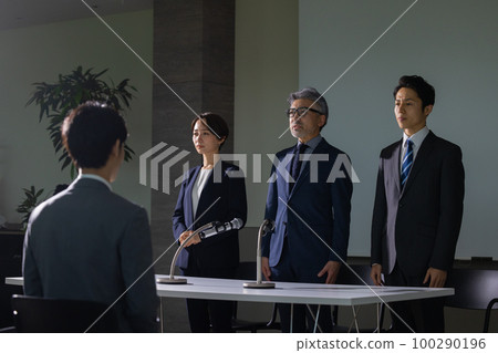 A man with gray hair who looks like an apology interview A man with gray hair who looks like an apology interview 100290196
