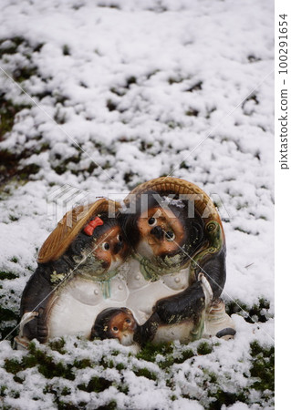 raccoon figurine in the snow raccoon figurine in the snow 100291654