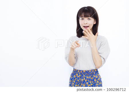 A woman in her thirties who is surprised A woman in her thirties who is surprised 100296712