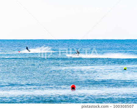 Exhilarating jet skiing in the Pacific Ocean at Byobugaura, Dover, Chiba, Japan Exhilarating jet skiing in the Pacific Ocean at Byobugaura, Dover, Chiba, Japan 100308507