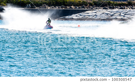 Exhilarating jet skiing in the Pacific Ocean at Byobugaura, Dover, Chiba, Japan 100308547