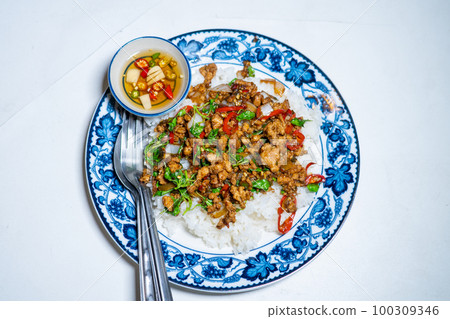 stir-fried basil with pork and fried egg stir-fried basil with pork and fried egg 100309346