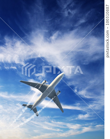 Vertical nature background with aircraft and Jet trailing smoke in sunset sky. Airplane and condensation trail Vertical nature background with aircraft and Jet trailing smoke in sunset sky. Airplane and condensation trail 100310887
