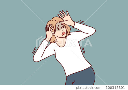 Frightened woman panicking and trying to dodge covering head with hands feeling danger and threat 100312801