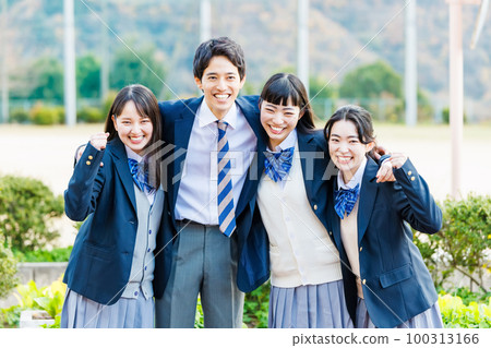 High school students standing on the school grounds 100313166