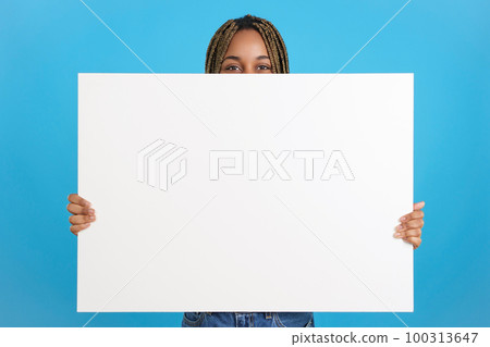 African woman holding a poster in white 100313647