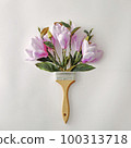 Minimal creative bouquet with flowers and paint brushes for paint.  100313718