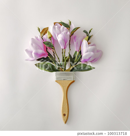 Minimal creative bouquet with flowers and paint brushes for paint. Minimal creative bouquet with flowers and paint brushes for paint. 100313718