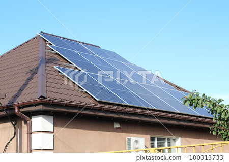 Solar panels on roof of house. Photovoltaic panels. solar system Solar panels on roof of house. Photovoltaic panels. solar system 100313733