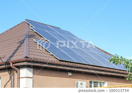 Solar panels on roof of house. Photovoltaic panels. solar system Solar panels on roof of house. Photovoltaic panels. solar system 100313734