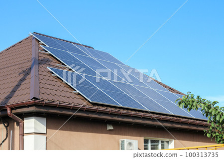 Solar panels on roof of house. Photovoltaic panels. solar system Solar panels on roof of house. Photovoltaic panels. solar system 100313735