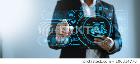 Businesswoman working virtual tablet computer twith reduce CO2 concept with icons, global warming such as reforest green factory recycle in office.. Businesswoman working virtual tablet computer twith reduce CO2 concept with icons, global warming such as reforest green factory recycle in office.. 100314776