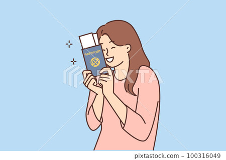 Smiling woman with passport and tickets Smiling woman with passport and tickets 100316049