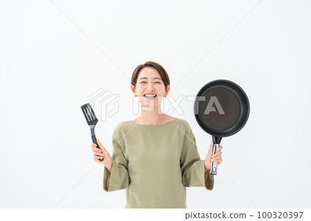 Women with cooking utensils Women with cooking utensils 100320397