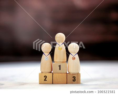 Achievement concept. Wooden podium 1, 2, 3, human standing on podium with ranking winner business and sport competition concept copy space Achievement concept. Wooden podium 1, 2, 3, human standing on podium with ranking winner business and sport competition concept copy space 100321581