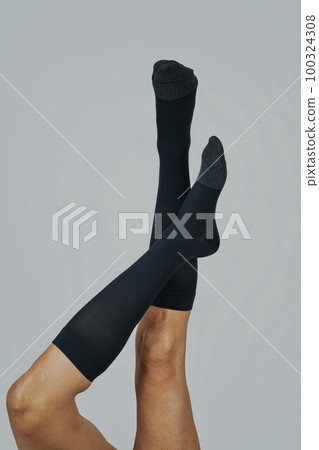man wearing compression socks upside down man wearing compression socks upside down 100324308