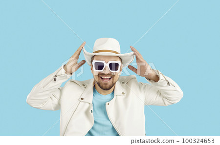 Portrait of smiling man in sunglasses and hat Portrait of smiling man in sunglasses and hat 100324653