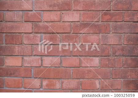 Red bricks piled in England 100325059