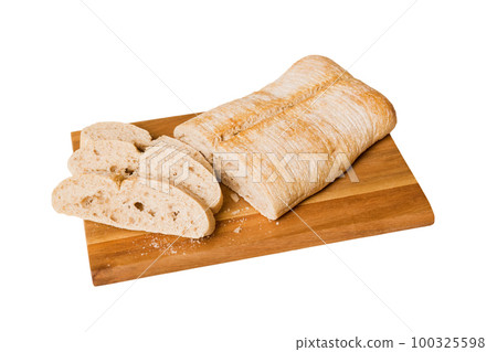 Assortment of freshly sliced baked bread with napkin isolated on white background. Healthy unleavened bread. French bread slice 100325598
