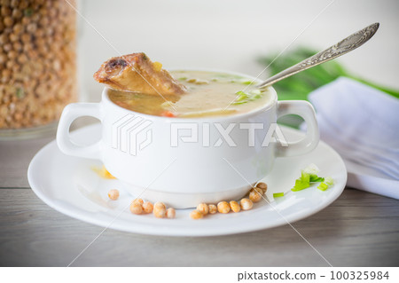 dried pea soup in a plate with herbs dried pea soup in a plate with herbs 100325984