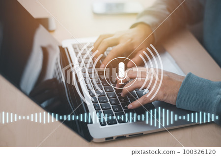 Businessman using laptop with microphone button on virtual screen. Blog blog speak talk advertising presentation, Voice recognition, speech detection and deep learning application,Voice Assistance 100326120