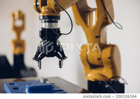 New Generation Robotic Arm Ready for Work on a Production Line. New Generation Robotic Arm Ready for Work on a Production Line. 100326164