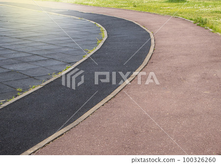 Close-up of a part of a sports stadium with markings for a treadmill 100326260