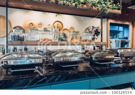 Catering equipment trays setup before event. Catering equipment trays setup before event. 100326554