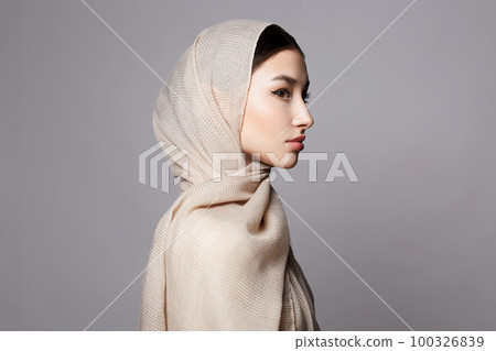 beautiful young muslim woman. beauty girl in hijab beautiful young muslim woman. beauty girl in hijab 100326839