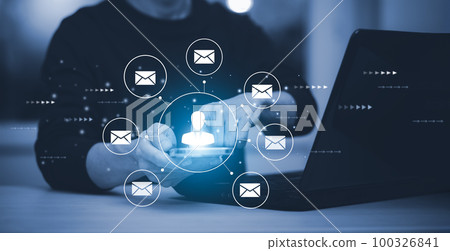 Businessman holding smartphone with communication icons, letter icon, email icons, and newsletter email and protect your personal information or spam mail, Customer service call center contact. Businessman holding smartphone with communication icons, letter icon, email icons, and newsletter email and protect your personal information or spam mail, Customer service call center contact. 100326841