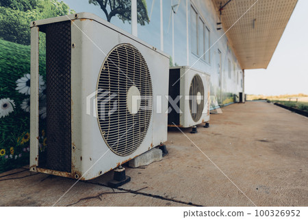 Air conditioner compressor installed in old building Air conditioner compressor installed in old building 100326952
