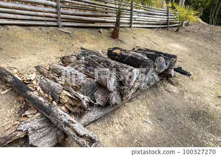 Dilapidated logs piled up Dilapidated logs piled up 100327270